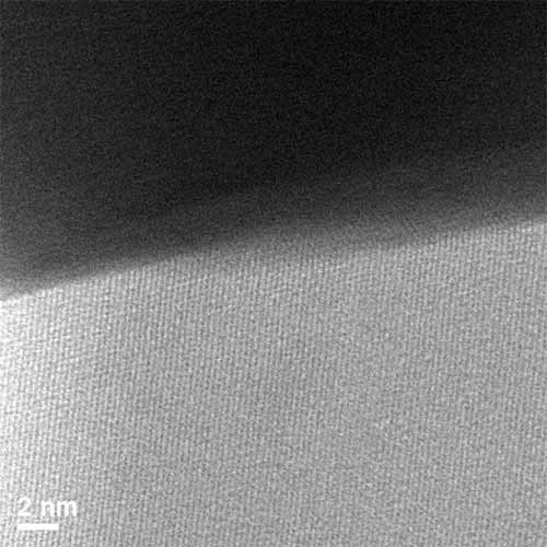 Interface between molten gold and silicon dioxide imaged at 250ºC. Image courtesy Bethany Hudak, Oak Ridge National Lab.